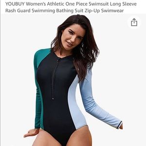 Long sleeve women’s swimsuit, size M. Never worn.